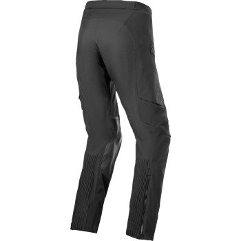 Alpinestars AMT-8 Stretch Drystar® XF motorcycle pants in black, medium size, with reinforced knee panels and stretch fabric.