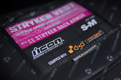 ICON Women's Field Armor Stryker™ vest in black and pink, size L/XL, with protective padding and adjustable straps.