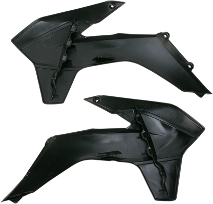 Black ACERBIS radiator shrouds for motorcycle body, designed for durability and a sleek appearance.