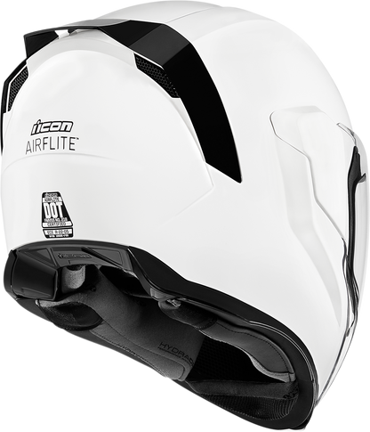 White ICON Airflite™ helmet with gloss finish, medium size, featuring aerodynamic design and clear visor for motorcycle riding.