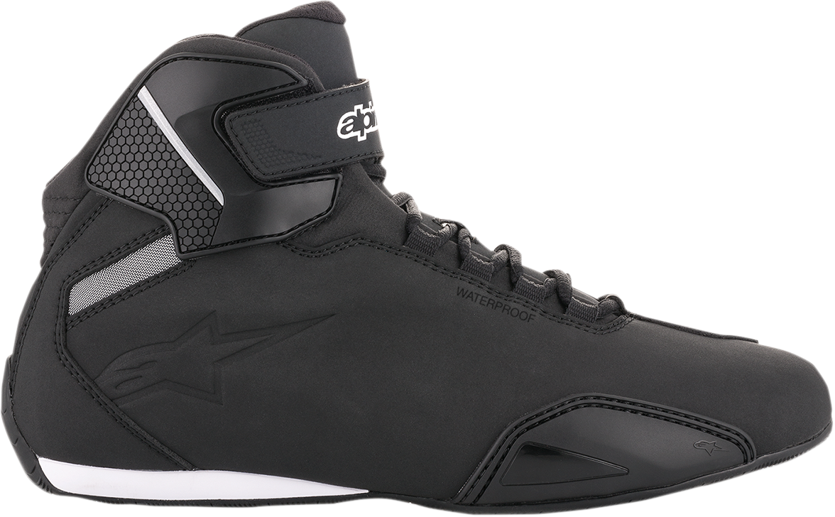 Alpinestars Sektor black motorcycle shoes in US 12.5 with durable design and sporty look, featuring logo accents and textured sole.