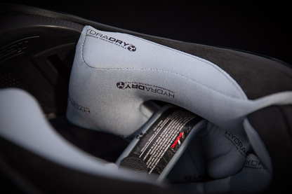 Red ICON Airframe Pro™ helmet in carbon fiber with XS size, featuring sleek aerodynamic design and detailed venting.