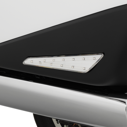 Bill's Exhausts Show Chrome LED marker lights for Honda GL1800 with clear lenses and red LEDs, mounted on motorcycle engine.
