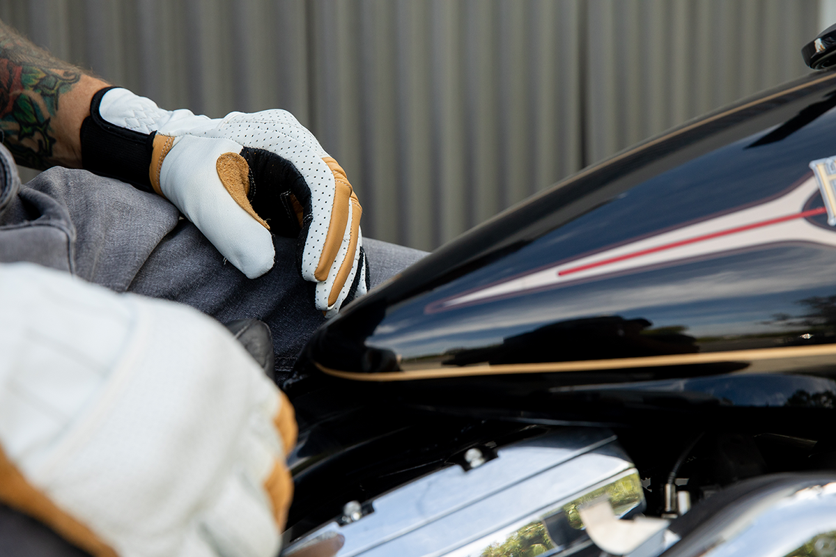 BILTWELL Borrego Gloves in cement color, size XL, made by Bill's Exhausts, shown with textured leather design and secure wrist strap.