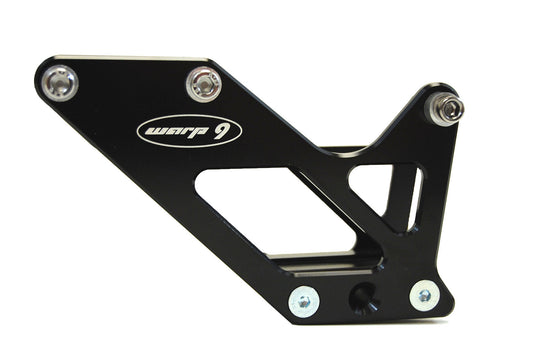 Suzuki DR650 motorcycle chain guide by Warp9Racing, close-up view showing sturdy construction and fitment details.