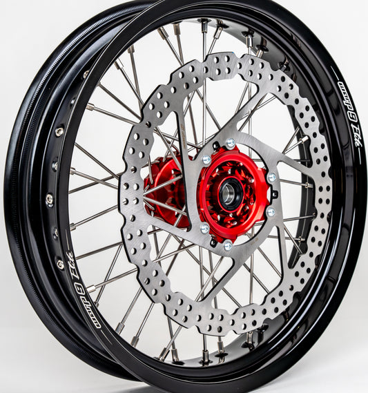 Honda CRF front 17-inch wheel by Warp9Racing, shown with spokes and hub detail, ready for off-road motorcycle fitment.