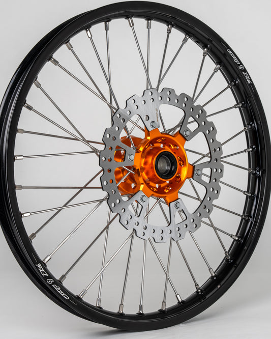 Warp9Racing KTM, Husqvarna, Gas Gas 21-inch front wheel with spokes and rim, ready for installation.