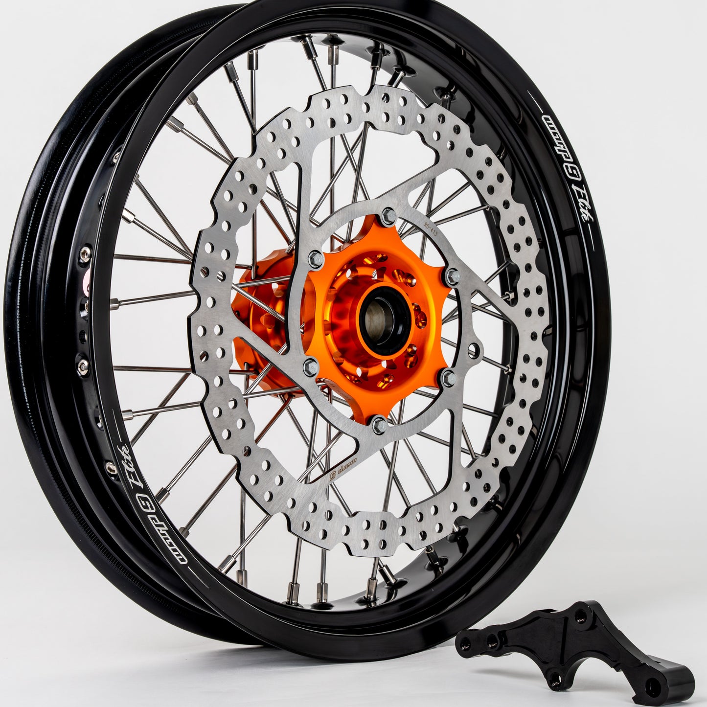 Warp9Racing early KTM front 17-inch wheel, in stock, showing sleek black design with spokes and tire mounting area.