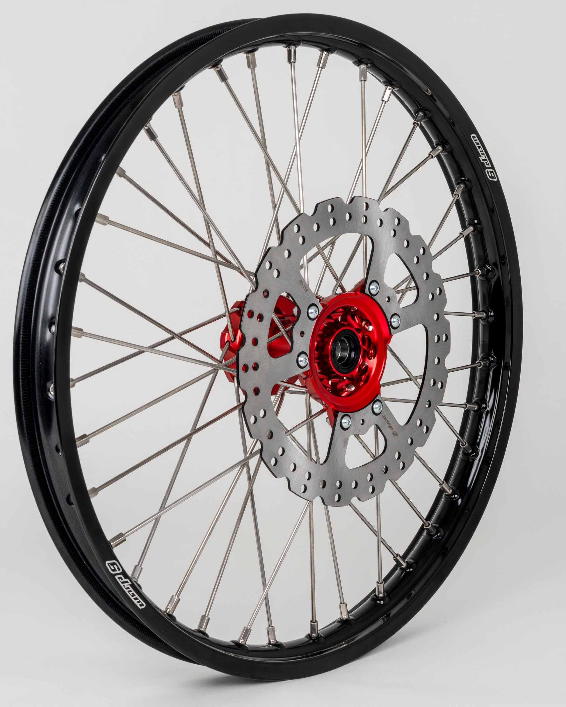 Warp9Racing Honda CR/CRF 21-inch front wheel showing spokes, rim, and hub for off-road motorcycle use.