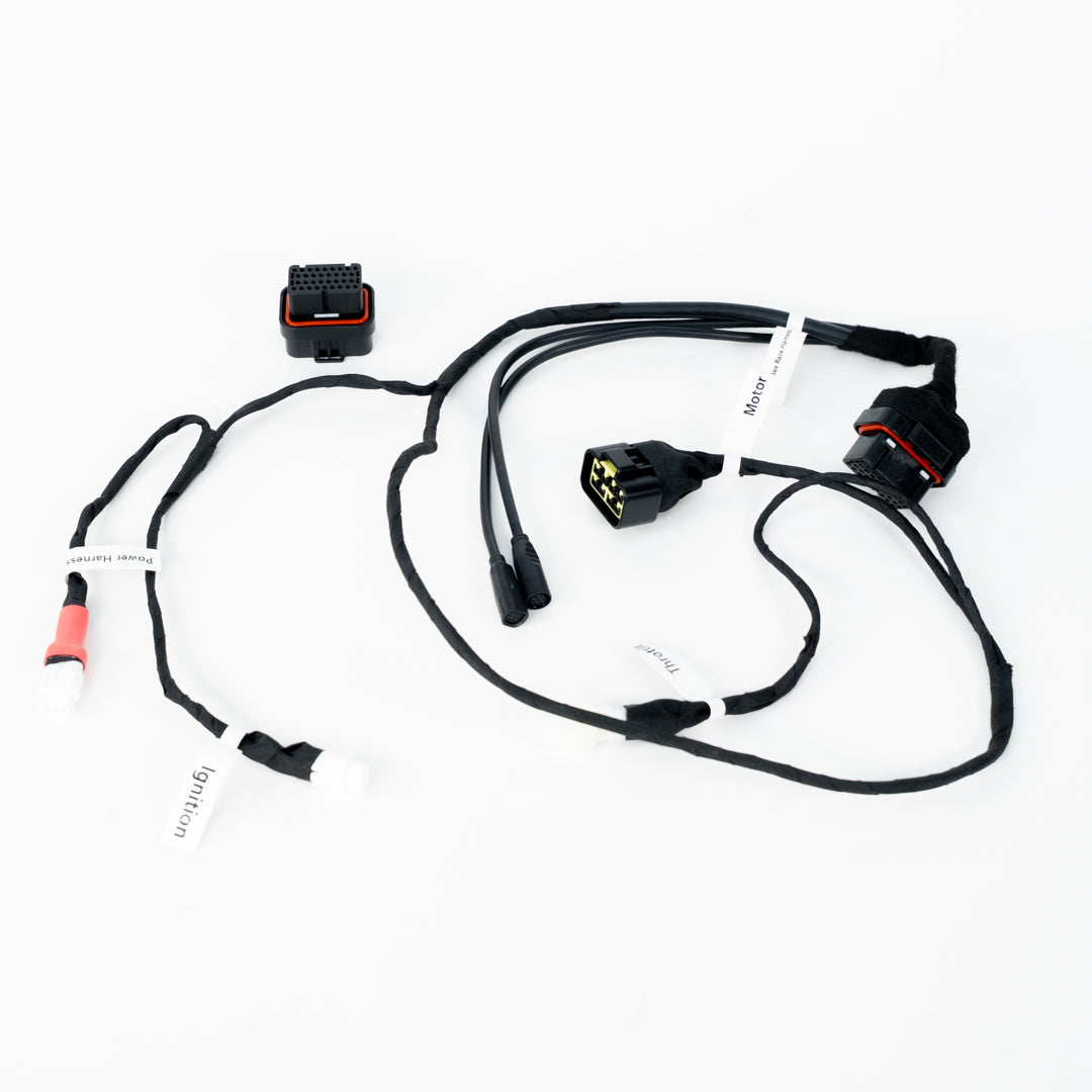 EBMX X-9000 V3 Race Wiring Harness controller for Surron Light Bee, plug-and-play installation, by Charged Powersports.