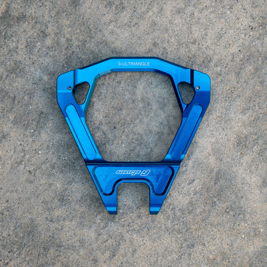 Warp9Racing Surron Ultra Bee Triangles assembly on electric bike, showcasing durable metal components and precise engineering.