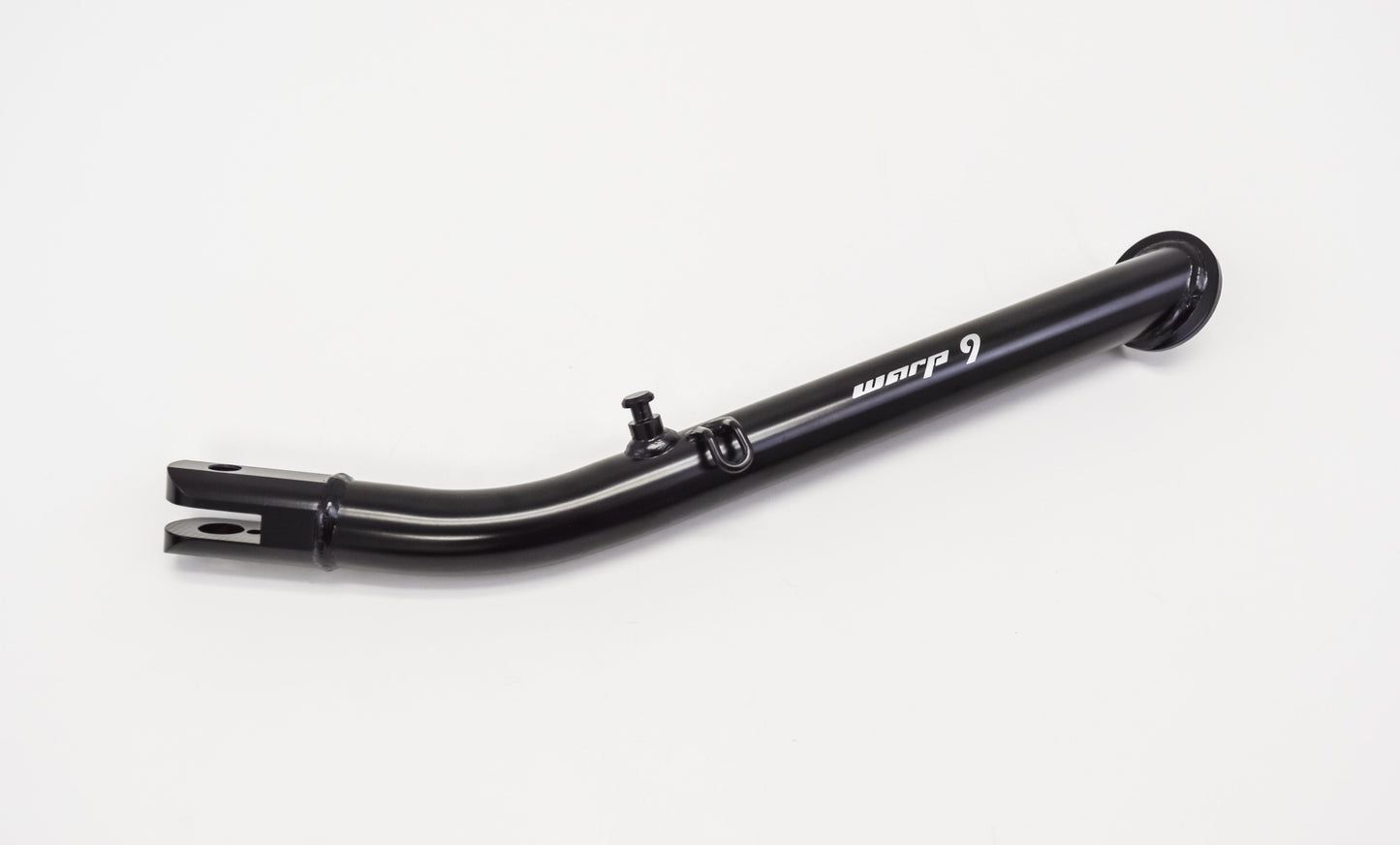 Warp9Racing Supermoto kickstand for models 690, 701, 700, mounted on a motorcycle, showcasing durable metal construction.