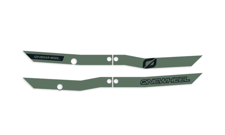 Dark olive Onewheel XR Classic Recurve Rail Guards installed on the skateboard's rails, showing a sleek protective design.