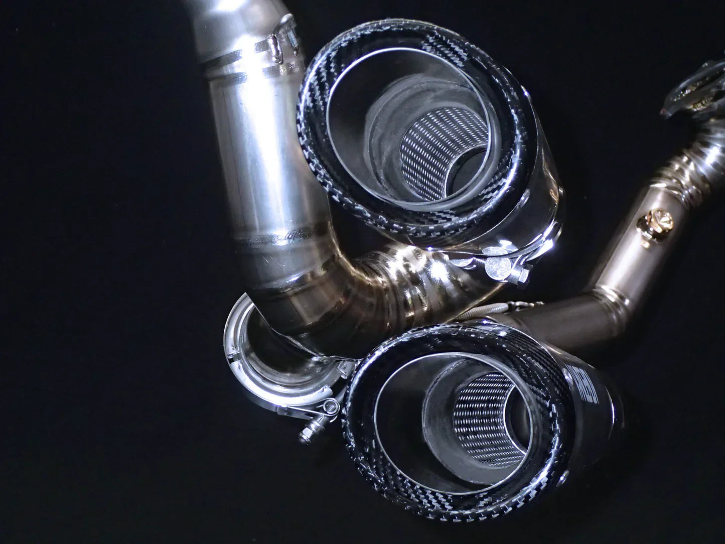 Ducati XDiavel and Diavel S 1260 Vandemon titanium exhaust system with mufflers removed, showcasing the sleek design.