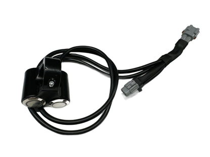 eDirtyBike dual headlight switch for Surron LBX and Talaria Sting MX3 electric bikes, showing the switch with wiring and mount.