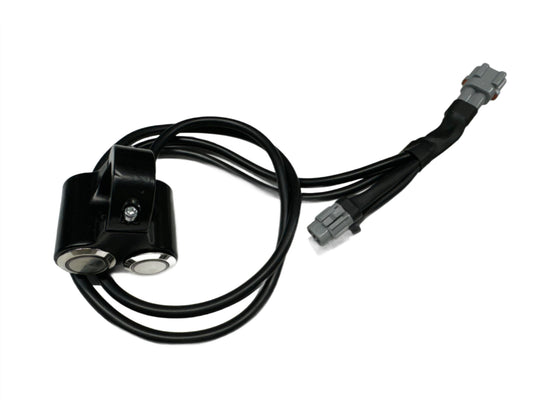 eDirtyBike dual headlight switch for Surron LBX and Talaria Sting MX3 electric bikes, showing the switch with wiring and mount.