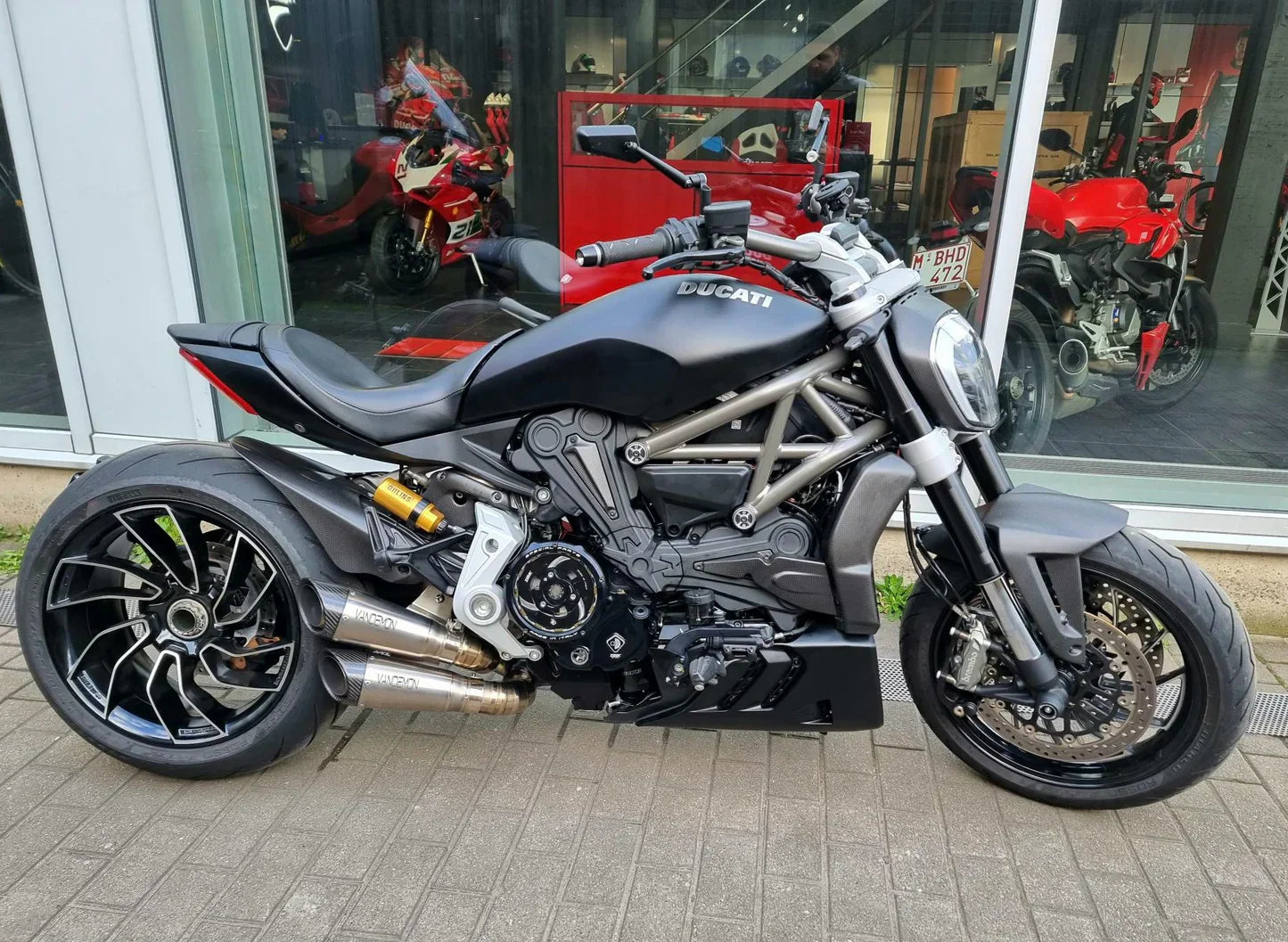 Ducati XDiavel and Diavel S Vandemon titanium exhaust system installed on a Ducati motorcycle, showcasing the sleek exhaust design.