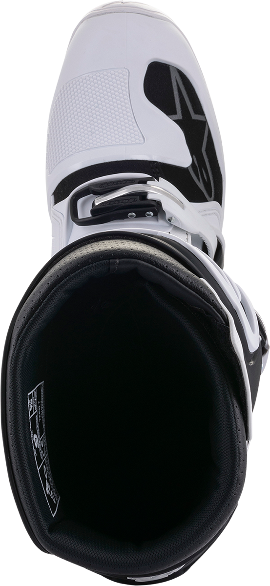 Alpinestars Tech 7 motorcycle boots in white and black, US size 10, featuring durable protective design and ankle support.