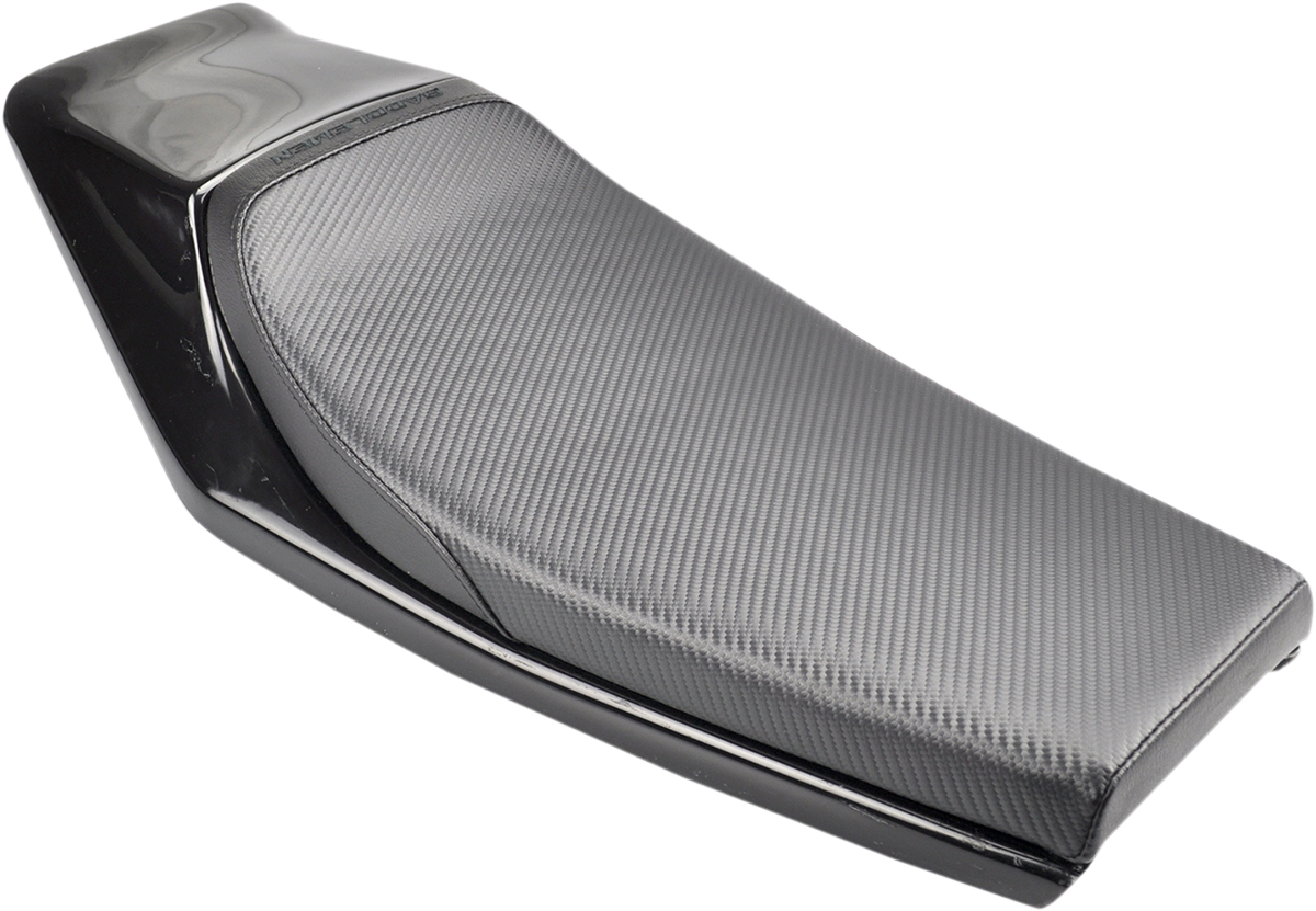 Carbon fiber Caballero seat for motorcycle by SADDLEMEN, with sleek, textured design and ergonomic shape for rider comfort.