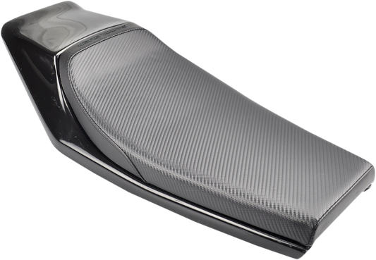 Carbon fiber Caballero seat for motorcycle by SADDLEMEN, with sleek, textured design and ergonomic shape for rider comfort.