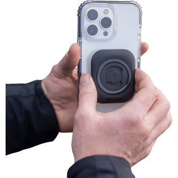SP CONNECT Mini 52667 adhesive mount for device, compatible with SPC+ series, shown on a vehicle surface.