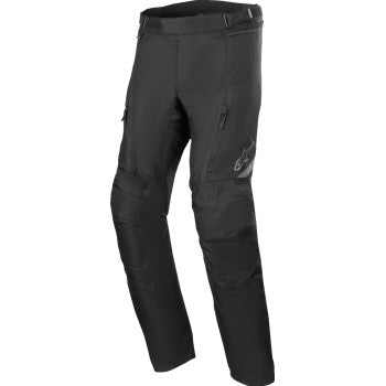Black Alpinestars ST-1 waterproof pants in medium size, shown with adjustable waistband and waterproof fabric for motorcycle riding.