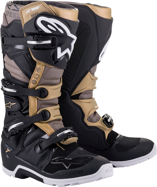 Alpinestars Tech 7 Enduro Drystar motorcycle boots in black, gray, and gold with US 13 size, rugged protective design.