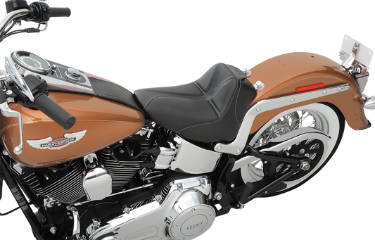 Black SADDLEMEN Dominator Solo Seat with gray stitching for FLSTC/N 2006-2017, featuring stitched detail and sleek design.