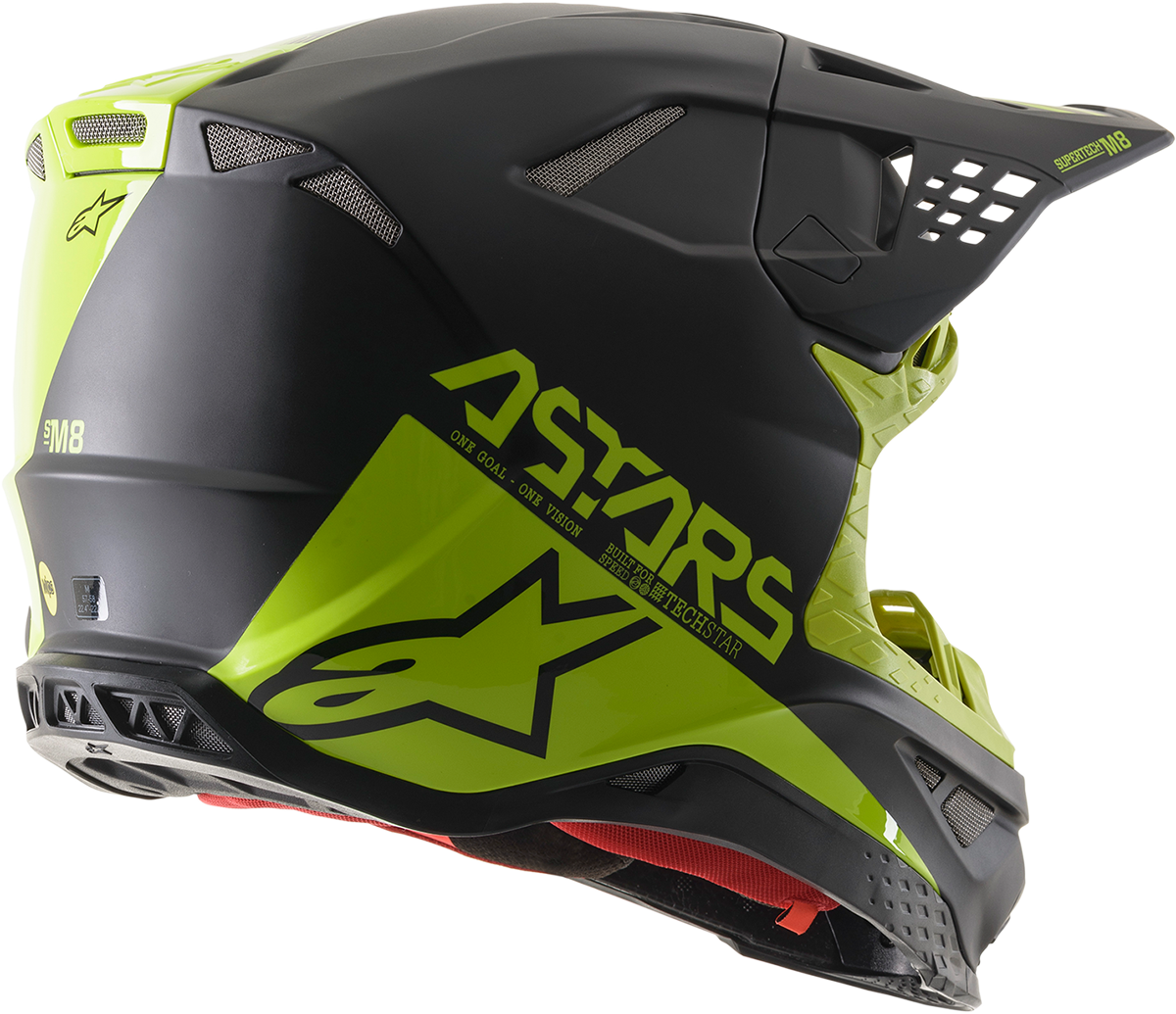 Alpinestars Supertech M8 helmet in black and yellow with MIPS® protection, small size, showing the helmet's sleek design and vents.