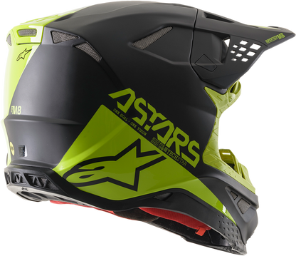 Alpinestars Supertech M8 helmet in black and yellow with MIPS® technology, size 2XL, shown from side angle.