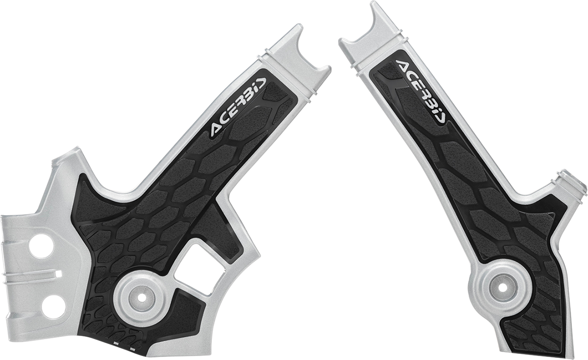 A set of silver and black Acerbis X-Grip motorcycle frame guards with body protection, designed for durable bike safeguarding.