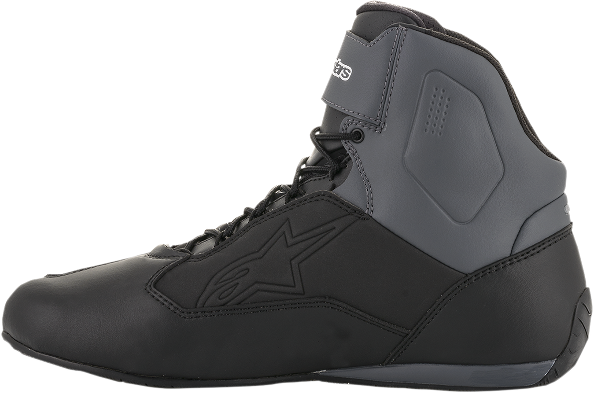 Alpinestars Faster-3 Drystar® motorcycle shoes in black, gray, and yellow with US 12 size, featuring protective design elements.