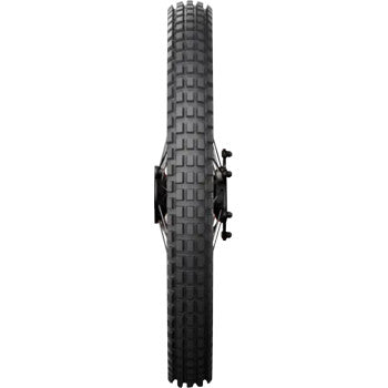Michelin Trial Competition front motorcycle tire 2.75-21 with 45M tread pattern, displayed on a stand against a plain background.