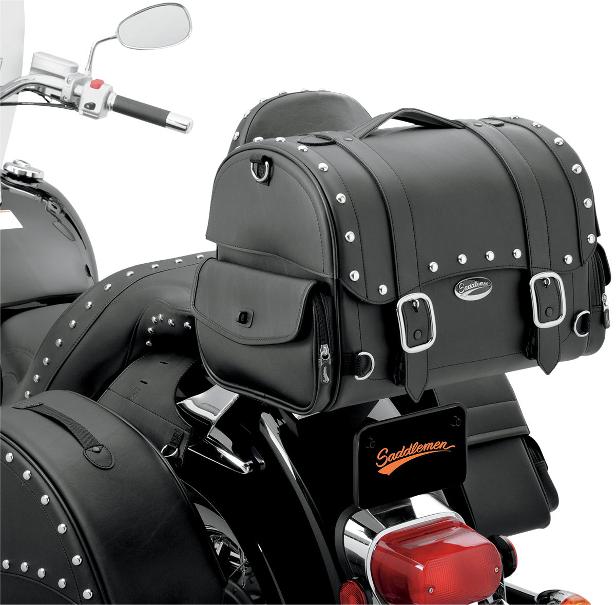 Saddlemens Desperado Express tail bag mounted on motorcycle seat, featuring durable material and secure attachment straps.