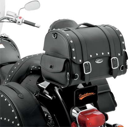 Saddlemens Desperado Express tail bag mounted on motorcycle seat, featuring durable material and secure attachment straps.