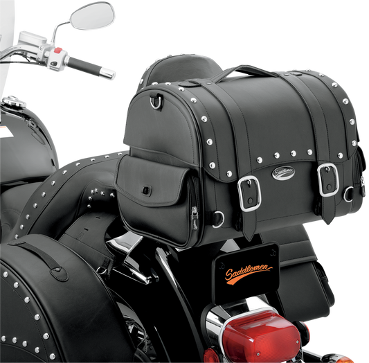 Saddlemens Desperado Express tail bag mounted on motorcycle seat, featuring durable material and secure attachment straps.