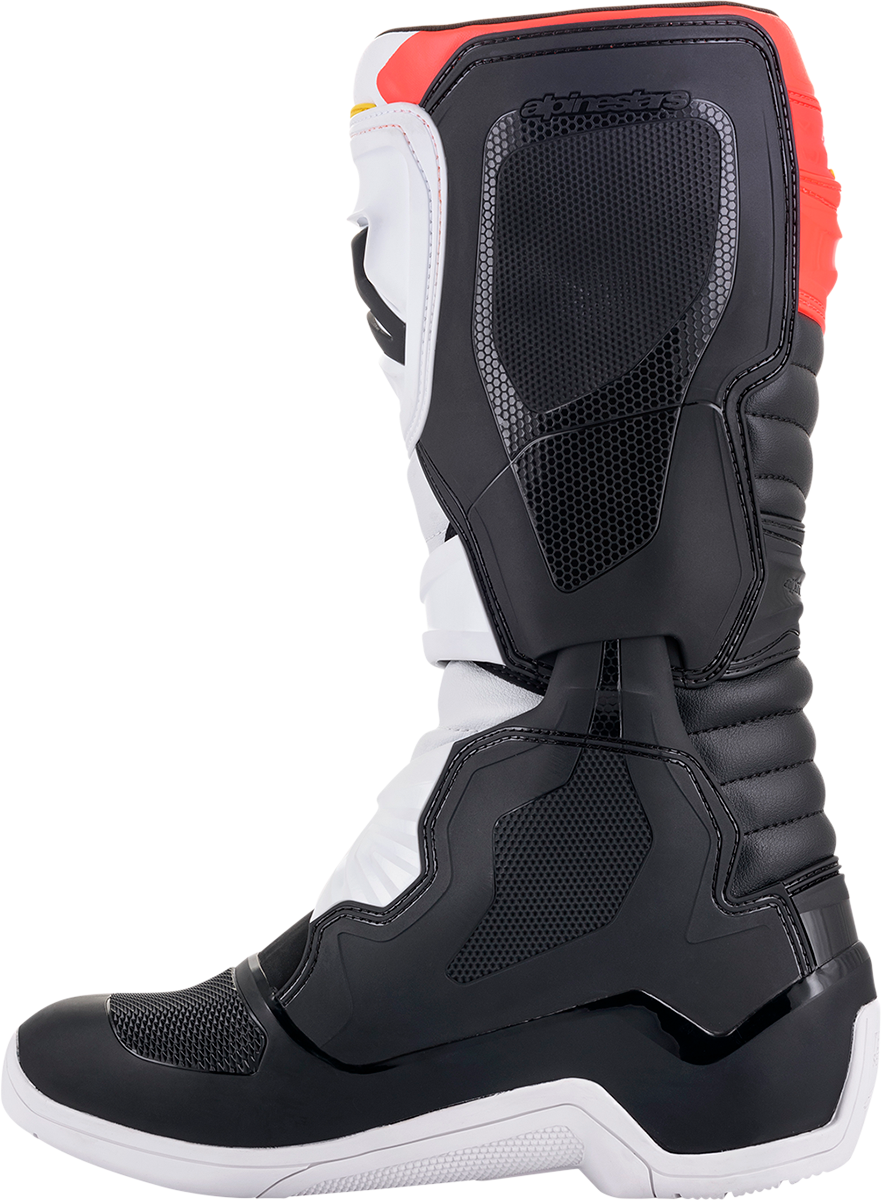 Alpinestars Tech 3 motorcycle boots in black, white, and orange with US size 7, featuring protective design and durable construction.