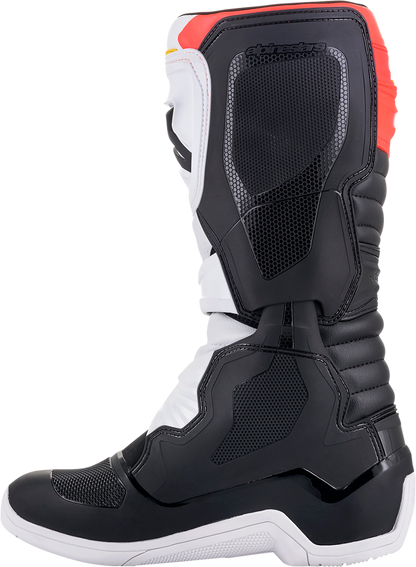 Alpinestars Tech 3 motorcycle boots in black, white, and orange with US size 7, featuring protective design and durable construction.