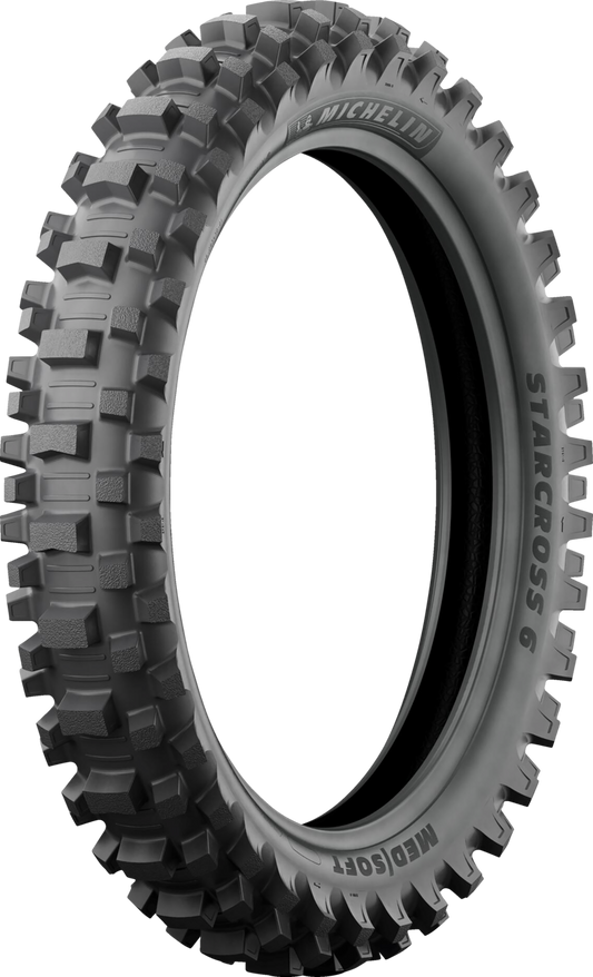 Michelin StarCross 6 Medium Soft rear motorcycle tire, 110/100-18 size, with tread pattern suitable for off-road riding.