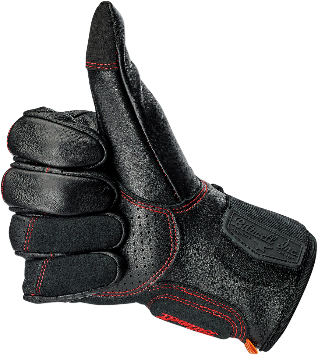 Red BILTWELL Borrego Gloves in XL size, showing textured leather grip and vibrant redline design for motorcycle riding comfort.