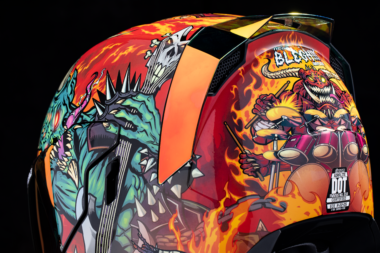 Bill's Exhausts ICON Airflite™ helmet in red with MIPS® protection, medium size, featuring aerodynamic design and ventilation.