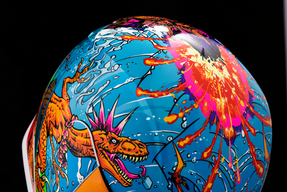 ICON Airform™ Dino Fury helmet in medium size, featuring a colorful dinosaur design and sleek helmet shape.