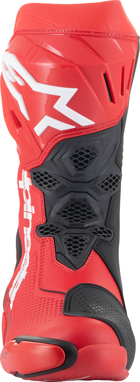 Alpinestars Supertech R motorcycle boots in red with black accents, US 9.5 / EU 44, showcasing the high-performance design.