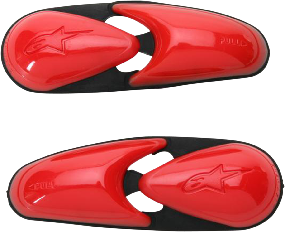 Red Alpinstars flexible toe sliders for motorcycle boots, designed for durability and enhanced riding performance.