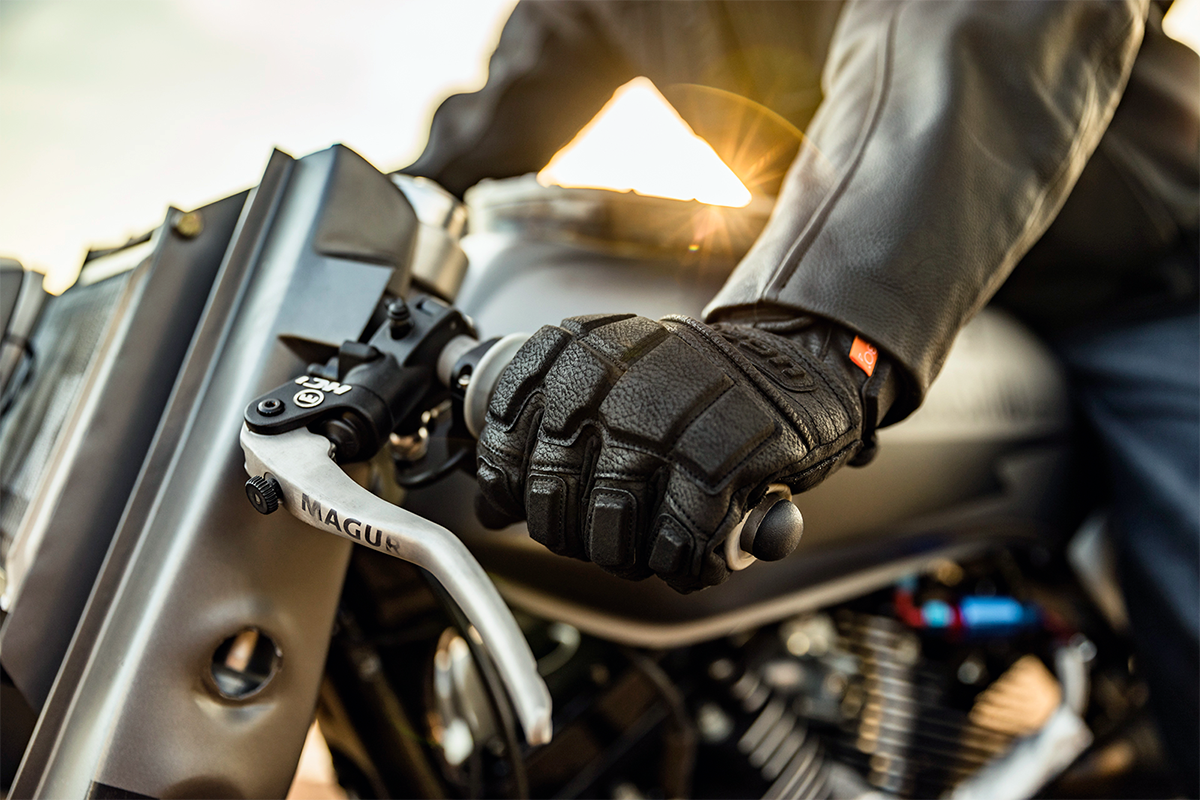 Black ICON Motorhead3™ CE gloves in 3XL size, featuring protective knuckles and durable material, designed for motorcycling safety.