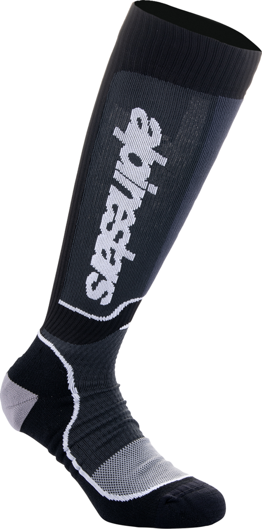 Alpinestars MX Plus motorcycle socks in black and white, large size, featuring breathable fabric and padded support for riding comfort.
