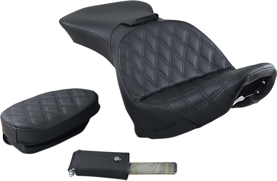 Black SADDLEMEN Explorer motorcycle seat with backrest and lattice stitching, designed for FLSTS models, by Bill's Exhausts.
