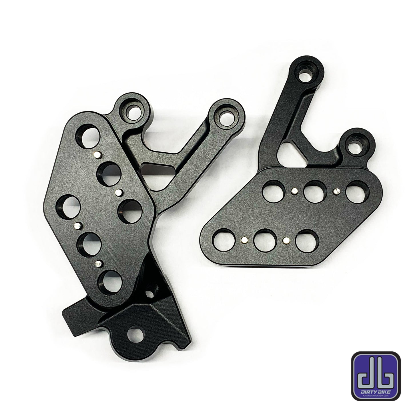 Black CNC aluminum foot peg drop bracket for Surron LBX by eDirtyBike, designed for eRide Pro motorcycle.