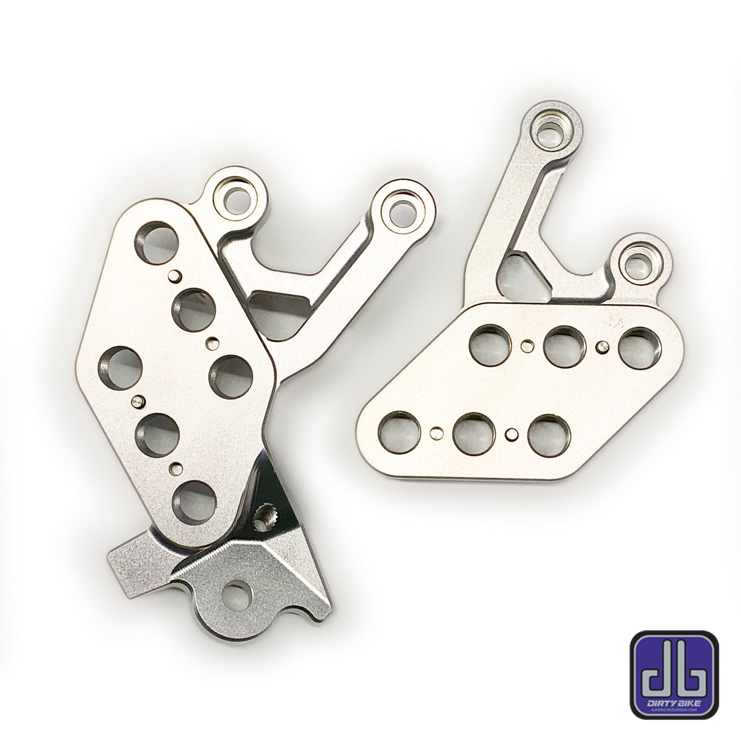 Silver CNC aluminum foot peg drop bracket for Surron LBX electric bike by eDirtyBike, designed for durability and performance.