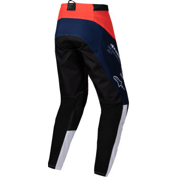 Alpinestars Pro-Dura motorcycle pants in navy, hot orange, and white with reinforced knee panels and adjustable waist.